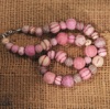 Necklace made from embroidered wool felt beads in shades of soft pink and beige