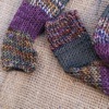 Merino wool skinny scarf in stripes of autumnal marl, green, and purple